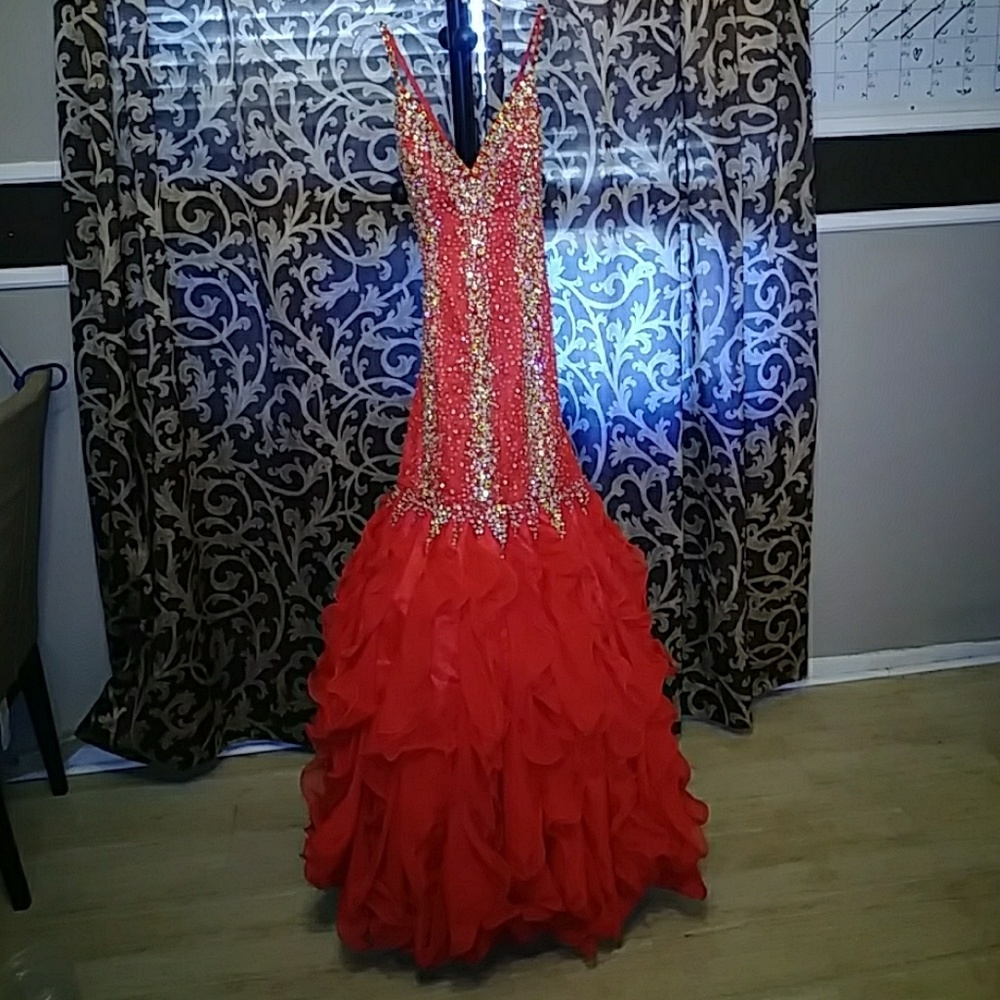 Red jeweled mermaid gown